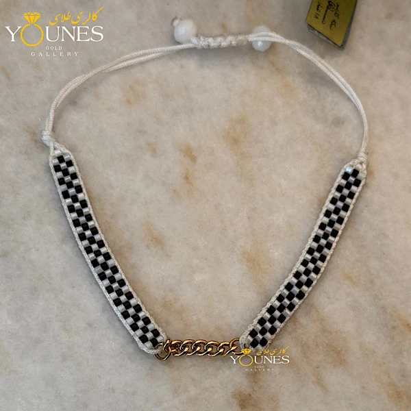 دستبند میوکی کارتیر طلا شطرنجی